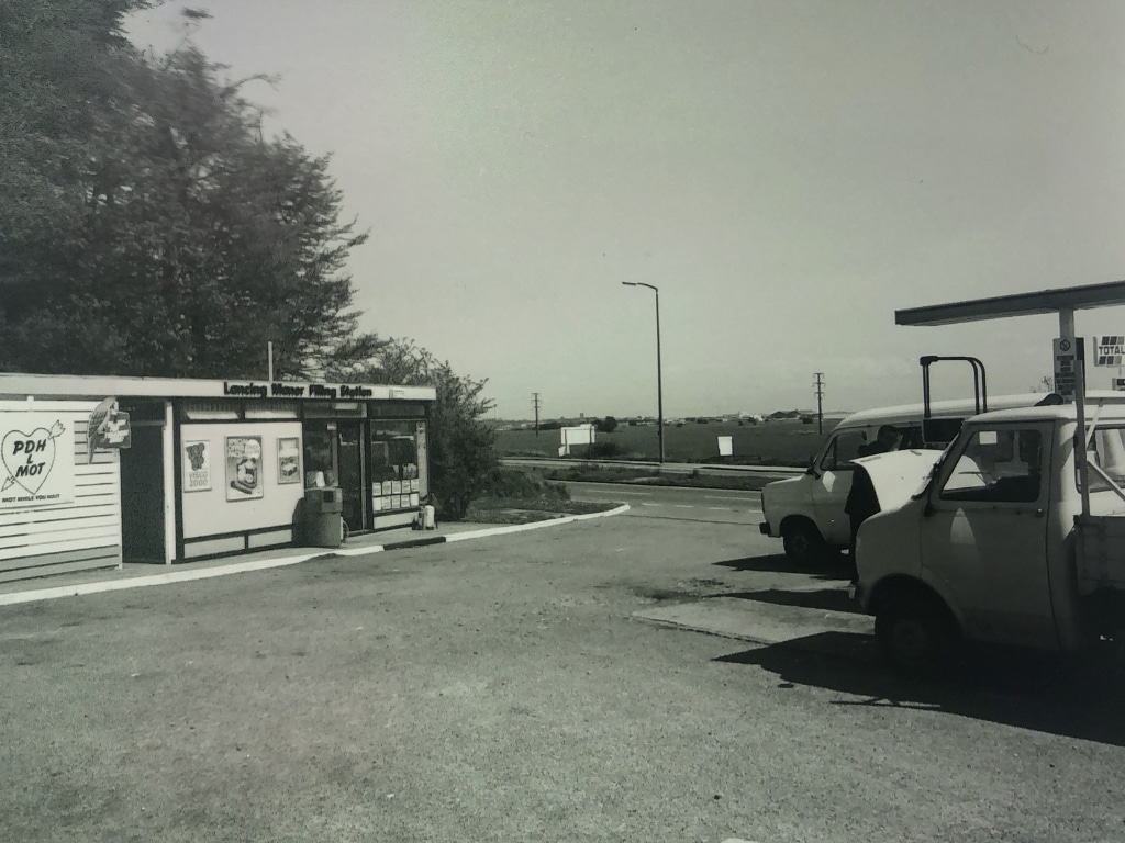 PDH Cars Lancing Manor Filling Station black and white photograph